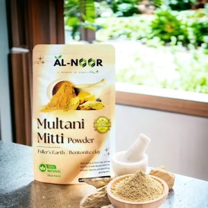 Al Noor Industries Multani Mitti Powder pouch with natural ingredients and mortar bowl on a table