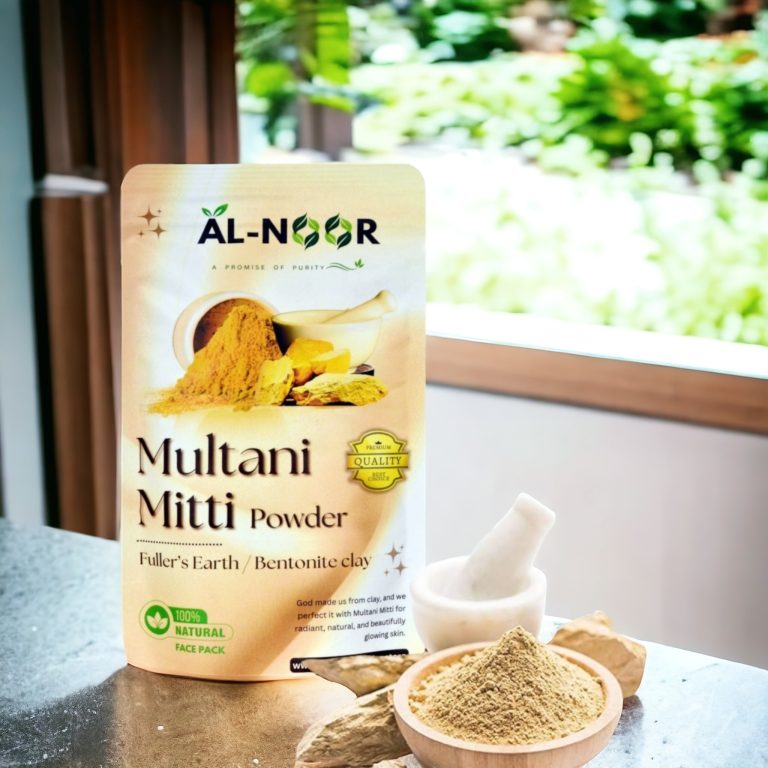 Al Noor Industries Multani Mitti Powder pouch with natural ingredients and mortar bowl on a table