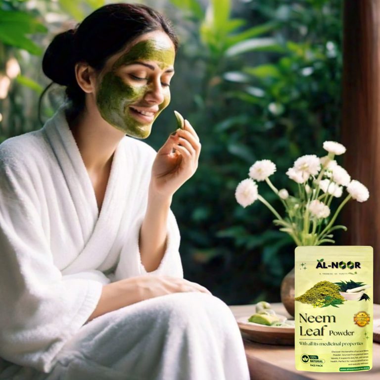 A woman in a white robe applying a neem face mask, smiling peacefully with Al Noor Neem Leaf Powder displayed beside her.